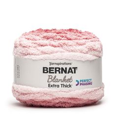 bernat blanketed extra thick yarn in pink, white and grey on a white background