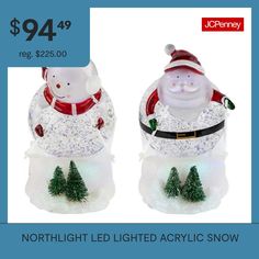 two snowmen with santa clause on their heads and trees in front of the image