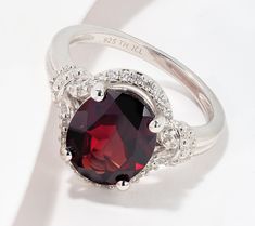 Place this sterling silver ring on your finger and exude vintage flair with an oval-shaped gemstone at the center surrounded by a halo of white zircon. From Affinity® Fine Jewelry. Pave Ring, Turquoise Gemstone, Sterling Ring, Prong Setting, Rhodium Plated, Sterling Silver Ring, Garnet, Silver Ring, Halo