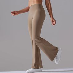 With a timeless design, these flare leggings are a wardrobe essential that will never go out of style. Pair them with a tailored blouse for a polished office look, or style them with a cozy sweater for a laid-back weekend ensemble. The possibilities are endless, making these pants a versatile staple in any fashion-forward wardrobe. Comfortable Elegance Flattering Silhouette Versatile Styling Seasonless Appeal Timeless Investment Stretch Wide-leg Yoga Pants For Fall, Fall Wide-leg Stretch Yoga Pants, Chic Stretch Yoga Pants For Work, Versatile Fitted Yoga Pants For Work, Chic Full-length Yoga Pants, Stretch Wide Leg Yoga Pants For Work, Chic Full Length Yoga Pants, Chic Fall Yoga Pants, Stretch Wide-leg Yoga Pants For Workwear