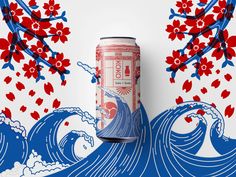 a can of red and blue beer sitting on top of a white wall with flowers