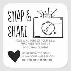 a white square sticker with the words snap & share on it and a black heart