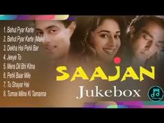 the song saaan jukebox is shown in front of an image of two people