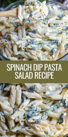 spinach dip pasta salad recipe in a glass bowl with a wooden spoon on the side