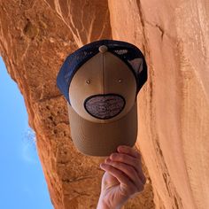 Love getting outdoors and checking out all the awesome landmarks Colorado has to offer? This unique Colorado Flag hat is not only great to wear while doing that, but it has a bunch of Colorado landmarks included. Within the Colorado Flag on this hat we have included a bunch of different aspects of the Colorado lifestyle as well as several Colorado landmarks that we all love so much. Take a closer look and see what you recognize...and better yet, where you still need to explore. Buy now and rep C Camping Hat With Curved Brim And Logo Patch, Brown Six-panel Hat With Logo Patch, 5-panel Camping Hat With Logo Patch, Colorado Hat, Vintage 5-panel Trucker Hat With Logo Patch, Colorado Flag, Flag Hat, Get Outdoors, Love Is All