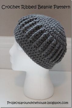 a crocheted beanie hat is shown on a mannequin head