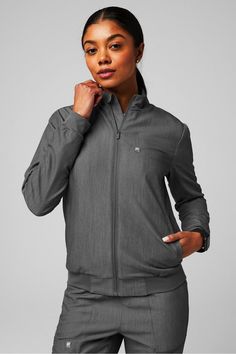 Daily 3-Pocket Scrub Jacket Fabletics Heather Grey female Activewear >> Scrubs >> Jackets >> Product Feed MotionTech regular 4-Way Stretch/Breathable/Lightweight Stretch Long Sleeve Track Jacket With Pockets, Stretch Outerwear With Pockets For Sports, Stretch Sports Outerwear With Pockets, Functional Stretch Outerwear With Pockets, Fitted Functional Track Jacket With Pockets, Athleisure Stretch Outerwear With Pockets, Stretch Athleisure Outerwear With Pockets, Winter Stretch Track Jacket With Pockets, Fitted Sports Track Jacket With Pockets