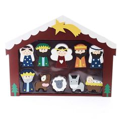 a wooden nativity scene with figurines in the shape of people and animals