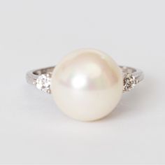 Elegant Timeless Classic Style Pearl Ring With Faux Diamond Accents And Sterling Silver Band By Pearlfection In Size 8 Minimalist Vibe ***Pearlfection Pearls Are 95% Pure Pearl Product. It's A Blend Of Nature & Science. These Pearls Start With The Same Identical Mother Of Pearl Nucleus That Is Used To Create Oyster Cultured Pearls. Instead Of Inserting The Nucleus Into The Oyster With The Oyster Applying Its Nacre, A Natural Aquatic Solution That Mimic's The Oyster's Nacre Is Applied By Man. The Real Pearl Jewelry, Luxury Classic Pearl Rings, Minimalist Luxury Pearl Drop Ring, Luxury Classic Pearl White Ring, Timeless Silver Pearl Ring With Polished Finish, Luxury Timeless Pearl Ring With Polished Finish, Feminine Capsule Wardrobe, Real Pearl Jewellery, Timeless Classic Style