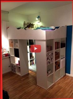 a loft bed with built in bookshelves and shelves on the bottom level is shown