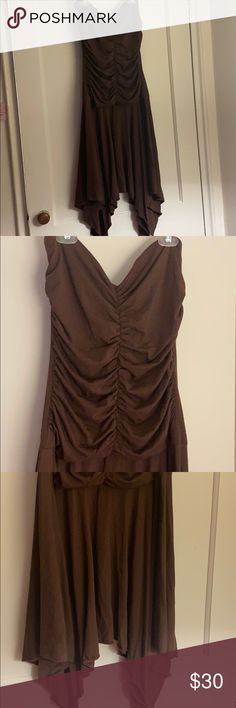 NWT Guess Jeans fox brown strapless dress New guess jeans strapless dress  Size: L  Color: Brown  Good condition  Tags attached Guess Dresses Strapless Brown Strapless Ruched Dress, Brown Sleeveless Dress With Ruched Bodice, Fitted Brown Strapless Dress For Summer, Brown Sleeveless Ruched Maxi Dress, Fitted Ruched Strapless Sundress, Brown Strapless Dress, Guess Dress, Guess Jeans, Dress Es