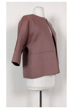 Sophisticated rose pink Michael Kors open cropped jacket. Crafted with a crew neck, three-quarter sleeves and tonal stitching throughout. The perfect layering piece for the season, you will love its soft-to-the-touch fabric blend. Size 8 Open front Rounded neckline Cropped sleeves Unlined 55% virgin wool, 40% angora, 5% cashgora Made in Italy Fall 2014 Bust 40" Waist 40" Shoulder to hem 23.5" Chic Pink Cropped Jacket For Spring, Elegant Pink Fitted Cropped Jacket, Pink Cropped Jacket For Spring Workwear, Spring Pink Cropped Jacket For Work, Chic 3/4 Sleeve Winter Outerwear, Elegant Pink Long Sleeve Cropped Jacket, Chic Structured Cropped Jacket For Spring, Structured Cropped Jacket For Spring, Modern Structured Cropped Jacket For Spring