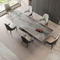 This stunning piece seamlessly combines opulence with practicality, making it the perfect centerpiece for your dining room. Measuring an impressive 78.74 inches in length, this expandable table effortlessly extends to a generous 110.24 inches, ensuring ample space to comfortably seat 8 to 10 guests. Whether you're hosting an intimate dinner party or a lavish gathering, our versatile table adapts to your needs with ease. Boasting the elegance of faux marble, each table is meticulously crafted to Grey Upholstered Dining Chairs, Marble Dining Table Set, Faux Marble Dining Table, Sintered Stone Dining Table, Expandable Table, Big Chair, Marble Dining Table, Stone Dining Table, Faux Leather Dining Chairs