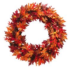 a wreath with red and orange leaves on it