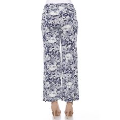 Our lightweight palazzo pants boast a floral paisley print that will give you the spring - summer vibes. Features a breezy wide-leg style and a banded fold-over waistband that you can adjust to suit your personal style. Pair it with your favorite solid top or tank and you are ready for the day! Spring Floral Print Wide Leg Pants, Casual Floral Print Wide Leg Pants For Spring, Summer Floral Print Wide-leg Bottoms, Summer Wide-leg Paisley Print Pants, Chic Summer Floral Print Wide Leg Pants, Floral Print Wide Leg Pants For Vacation In Spring, Floral Print Wide Leg Pants For Spring Vacation, Chic Summer Wide Leg Pants With Floral Print, Floral Print Long Pants For Day Out