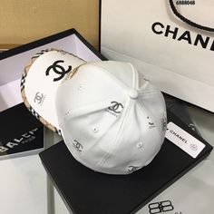 SHOP MORE LUXURY PRODUCTS HERE Description Chanel Cap White Chanel branded Cap with a dynamic and youthful design WhiteWhite FabricCC Logo Includes box, dust bag.This product is of the premium quality. Chanel Cap, Dior Shirt, Gucci Shirt, Louis Vuitton Shirt, Chanel Shirt, Branded Caps, Chanel Brand, Cap White, Gucci Gg Marmont