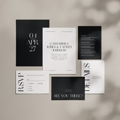 an assortment of black and white wedding stationery with the wording printed on it