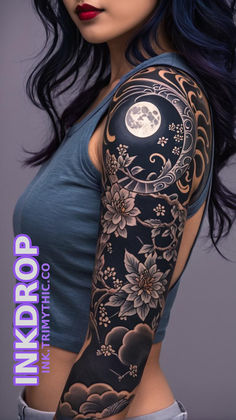 a woman with blue hair and tattoos on her arm