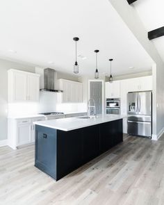 (paid link) black and white french kitchen Modern Kitchen Design Black And White, Industrial White Kitchen, White Kitchen With Black Island, Kitchen With Black Island, White Kitchen Black Island, Unique Kitchen Design, Black Island, Modern Kitchen Design Black, Black Kitchen Island