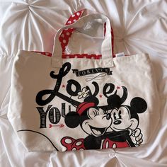 Brand New With Tags Attached. Both Sides Are Cute And Red Heart And Polka Dot Lining Too. Versatile Bag Can Be Used For So Many Things Or Even A Baby Bag. Purchased From Disney Store, Bag Is A Light Cream Color Cute Mickey Mouse Bags For Gifts, Cute Mickey Mouse Bags As Gift, White Minnie Mouse Bag For Daily Use, Red Minnie Mouse Bag For Gift, Casual White Minnie Mouse Bag, Cute Rectangular Minnie Mouse Bags, Mickey Mouse Tote Bags For Daily Use, Cute Mickey Mouse Bags For Travel, Cute Mickey Mouse Bag For Daily Use