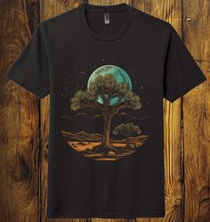 Beautiful eye catching Joshua Tree Cactus Desert Graphic Outdoor TShirt Black Unisex Soft shirt design on a super soft lightweight tri-blend unisex shirt. This shirt is printed by me at the time of order using an Epson F2100 Direct To Garment Printer. I currently have S,M,L and XL shirts on hand. If you need a different size, please reach out and I will make it happen for you. Every BODY is loved and important to us. Processing time is as little as the same day but could potentially be 3-5 busin Tree Tshirt Design, National Park Shirts, Outdoor Tshirt, Joshua Tree Desert, Desert Graphic, Minimalist Tshirt, Tree Tshirt, Cactus Desert, Boho Tees