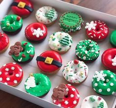 a box filled with lots of different decorated doughnuts