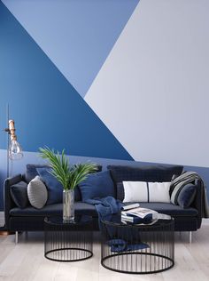 a living room with blue and white walls