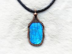 "Sleek Labradorite Pendant Necklace created with Wire Wrapping. Copper Crystal Wire Wrapped Pendant, Protection Necklace Witchy Jewelry Unique Handmade Artisan Jewelry !! Original Designs by ArtsvilleHandcrafted The pendant is made from pure copper wires and Labradorite stone combination.. Wear this necklace for the healing properties of this amazing stone.    Select Necklace Length of your choice !! All Jewelry is nicely packed and dispatched within 1-2 working Days. I love to create beautiful Handmade Artisan Labradorite Jewelry, Soldered Labradorite Necklace For Gift, Soldered Labradorite Necklace Gift, Copper Rectangular Pendant Jewelry For Gifts, Labradorite Jewelry With Soldered Details As Gift, Handmade Spiritual Jewelry With Rectangular Pendant, Handmade Spiritual Rectangular Pendant Jewelry, Witchy Protection, Crystal Wire Wrap