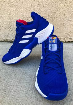 Kansas Jayhawks Blue Pro Bounce 2018 Low Mens Shoes Adidas Blue Mid-top Basketball Shoes, Adidas Blue Basketball Shoes, Adidas Blue Basketball Shoes With Boost Midsole, Blue Low-top Basketball Shoes For Sports Season, Blue Low-top Basketball Shoes, Adidas Blue Breathable Basketball Shoes, Adidas Basketball Shoes With Boost Midsole, Adidas Basketball Shoes With Boost Midsole For Sports Events, Sporty Blue Basketball Shoes