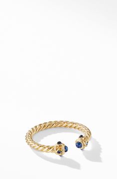 This ring merges sculptural form with the brilliant jewel tones found in classical painting to produce a collection that is quintessential David Yurman. 1/4" width .47 total carat weight 18-karat yellow gold/pavé diamonds/ruby, emerald or sapphire Imported >Diamond Guide Light Blue Sapphire, David Yurman Ring, Preppy Jewelry, Gold Jewelry Stores, Chalcedony Ring, Jewelry Accessories Ideas, Dope Jewelry, Jewelry Fashion Trends, Jewelry Essentials