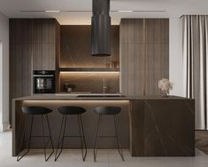 a modern kitchen with marble counter tops and bar stools