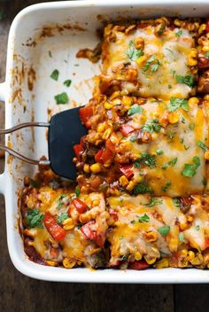 a casserole dish filled with mexican food