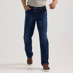 Stay comfortable all day long in Wrangler® Men’s Relaxed Fit Denim. These classic jeans come with a relaxed fit and straight leg opening to give your legs some well-deserved breathing room. They’re crafted from a durable cotton blend for easy care with just a little stretch for flexibility. Features include the signature five-pocket styling, button and zipper fly, “W” embroidery, and a logo patch for authenticity. Breathing Room, Stretches For Flexibility, Athletic Fit Jeans, Classic Jeans, Straight Fit Jeans, Fabric Tape, Tapered Jeans, Relaxed Fit Jeans, Athletic Fits