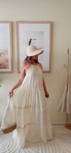 This handmade Bohemian dress is crafted from 100% organic cotton. Its flowing silhouette and tiered layers embody a free-spirited charm, making it a perfect choice for warm days while promoting sustainable craftsmanship. White Bohemian Dress, White Bohemian, Boho Chic Dress, Dress Bohemian, Bohemian Wedding Dress, Charm Making, Dress Boho, Free Spirited, Bohemian Wedding