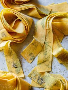 several pieces of pasta on a white plate