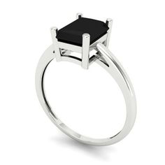 a black stone ring on a white background