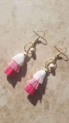 Check out this item in my Etsy shop https://www.etsy.com/listing/738791285/gold-and-pink-tassel-earrings Pink Tassel Earrings, Tassel Earing, Red Boho, Pink Tassel, Gold And Pink, White Howlite, Atlanta Ga, Tassel Earrings, Pink And White