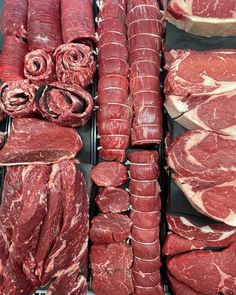 raw meats are displayed on display for sale