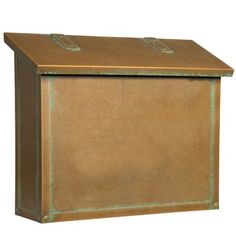 a brown metal box with two handles on the top and bottom, sitting against a white background