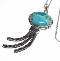 Tibetan turquoise necklace 925 Sterling silver necklace Turquoise gemstone necklace Big turquoise gem Large turquoise Long horizontal turquoise pendant  Handmade pendant necklace One of a kind gemstone pendant Unique pendant December birthstone Natural turquoise jewelry Sterling silver jewelry Dimensions: Sterling silver chain length 50 cm  Sterling silver pendant 8 x 3 cm Turquoise gemstone 2.5 x 1.8 cm Turquoise Pendant Necklace With Cabochon, Turquoise Sterling Silver Necklace With Round Pendant, Sterling Silver Turquoise Cabochon Pendant Necklace, Turquoise Pendant Necklace Stamped 925, Stamped 925 Turquoise Pendant Necklace, Turquoise Gem, Handmade Pendant Necklace, Necklace Big, Tibetan Turquoise