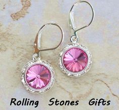 "These are Swarovski 12mm Rose Surrounds 925 Sterling Silver Leverback Earrings. These earrings measure 1 1/8\" high x 1/2\" wide. Order 1 pair or 100 pairs the shipping is a low flat for the entire order, in the U.S Rhinestones--Swarovski Crystal Leverbacks---Solid 925 Sterling Silver Settings-Sterling Silver Plated Earrings come carded and in our Gold Foil embossed cotton filled Gift Boxes From our different pics you can see how the same earring can appear different colors in different lightin Classic Pink Sterling Silver Earrings, Pink Lever Back Earrings For Anniversary, Pink Earrings With Lever Back For Anniversary, Sterling Silver Lever Back Earrings For Anniversary, Pink Sterling Silver Earrings For Mother's Day, Adjustable Lever Back Jewelry Gift, Adjustable Lever Back Jewelry As A Gift, Silver Lever Back Jewelry Gift, Silver Lever Back Jewelry As Gift