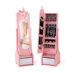 a pink jewelry cabinet with mirror and drawers