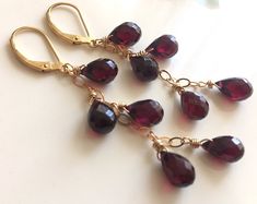 Sexy Garnets! These are all about 8-9 mm each so they are not too heavy to wear. Faceted Teardrop Rhodolite "pink" garnets dangle from your choice of sterling silver, 14k gold filled or 14k rose gold filled chain. Please note the earwires shown are an upgrade from the standard price. Length is about 2.5". Please choose your earwire preference. Your jewelry will arrive beautifully giftboxed. Opal Bar Necklace, Blush Earrings, Pink Garnet, Emerald Green Earrings, Wire Jewelry Tutorial, Garnet Jewelry, Rainbow Earrings, Garnet Earrings, Leverback Earrings