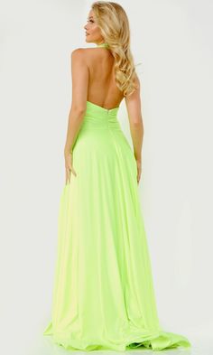 Stand out in this lime green halter prom dress from JVN by Jovani. A sheer inset supports the v-neckline that plunges to the wide waistband of this backless prom dress. Parting in a sultry side slit, the long skirt of this neon prom dress ends in a short train. Perfect for formal dances, this JVN by Jovani lime green prom dress is a fun and vibrant style. Lime Green Prom Dresses, Prom Dress Halter, Halter Prom Dress, Neon Prom Dresses, Prom Dress With Train, Chic Cocktail Dress, Halter Prom Dresses, Prom Dresses Jovani, Evening Dress Floor Length