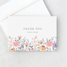 a thank card with watercolor flowers on it