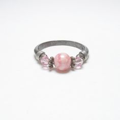 AVON Sterling Silver 1.00 Ct Natural Pink Rhodochrosite And Pink Bead Ring Vintage Pink Round Stackable Jewelry, Nickel Free Pink Promise Ring, Pink Stackable Round Jewelry, Pink Stackable Round Crystal Ring, Adjustable Pink Gemstone Stackable Rings, Nickel-free Pink Rings For Anniversary, Pink Stackable Crystal Ring, Adjustable Pink Crystal Birthstone Ring, Classic Pink Cabochon Rings