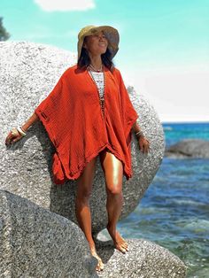 "Poncho Sleeves Top, Bikinis Cover up, Beach Poncho, Cotton Poncho-Style Sleeved Top Super soft kimono jacket 100% Natural cotton (2 layers ) with subtle texture. Medium thick, soft, flowy and so comfy! Sizing: Made in one size to fit S to XXL / US: 2/4/6/8/10/12/14/16/18 Measurement; Width end to end 40\" Length 28\" Description: One size fits all cover-up kimono cardigan that is so versatile. It has wood button closure on both sides and in the front. You can be very creative with it and can ev Bohemian Swimwear For Warm Weather Vacation, Bohemian Swimwear For Vacation In Warm Weather, Bohemian Orange Swimwear For The Beach, Bohemian Orange Swimwear For Beach, Orange Bohemian Cover-up For Beach Season, Orange Bohemian Style Cover-up For Beach Season, Orange Bohemian Beach Cover-up, Orange Bohemian Beach Cover-up Swimwear, Orange Bohemian Swimwear For Beach