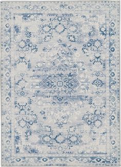 a blue and white rug with an ornate design