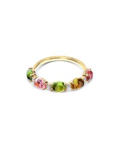 A colorful 18kt ring in gold, diamonds and tourmaline boules with a timeless charm. A jewel that with great elegance celebrates the encounter between Nature and craftsmanship. DIAMONDS:- Weight (total): 0.06 CT- Clarity: VS- Color: G- Cut: roundNatural stones:- TOURMALINE Weight (total): 2.15 CT Elegant Multicolor Rings With Rose Cut Diamonds, Yellow Gold Tourmaline Gemstones With Accents, Luxury Tourmaline Rings With Rose Cut Diamonds, Fine Jewelry Multi-stone Tourmaline Gemstones, Multi-stone Tourmaline Fine Jewelry, Luxury Tourmaline Jewelry With Rose Cut Diamonds, Multicolor Tourmaline Gemstones For Fine Jewelry, Multicolor Tourmaline Gemstones Fine Jewelry, Multicolor Tourmaline Fine Jewelry