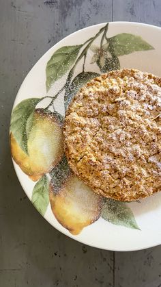 a white plate topped with an oatmeal cookie